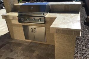 A grill is sitting on top of the counter.