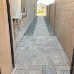 A walkway with a lot of tile on the ground